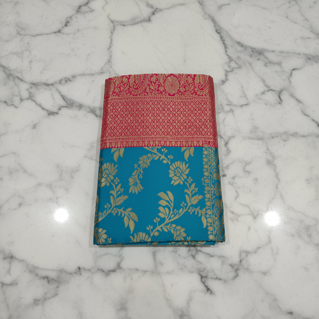Banarasi Pure Silk Saree with luxurious Gold Zari Floral Buttas all over the saree and Pallu in Turquoise Blue and Red Color