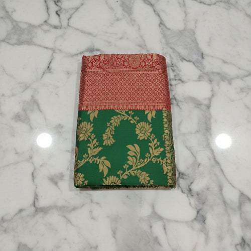 Banarasi Pure Silk Saree with luxurious Gold Zari Floral Buttas all over the saree and Pallu in Green and Red Color