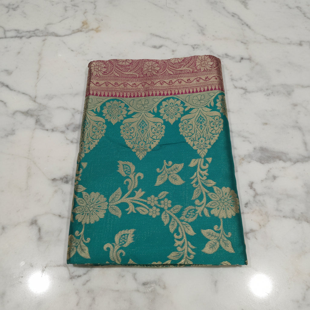 Banarasi Pure Silk Saree with luxurious Gold Zari Floral Buttas all over the saree and Pallu with leaf pattern in Turquoise Green Reddish Maroon Color