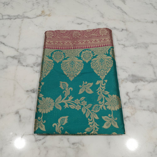 Banarasi Pure Silk Saree with luxurious Gold Zari Floral Buttas all over the saree and Pallu with leaf pattern in Turquoise Green Reddish Maroon Color