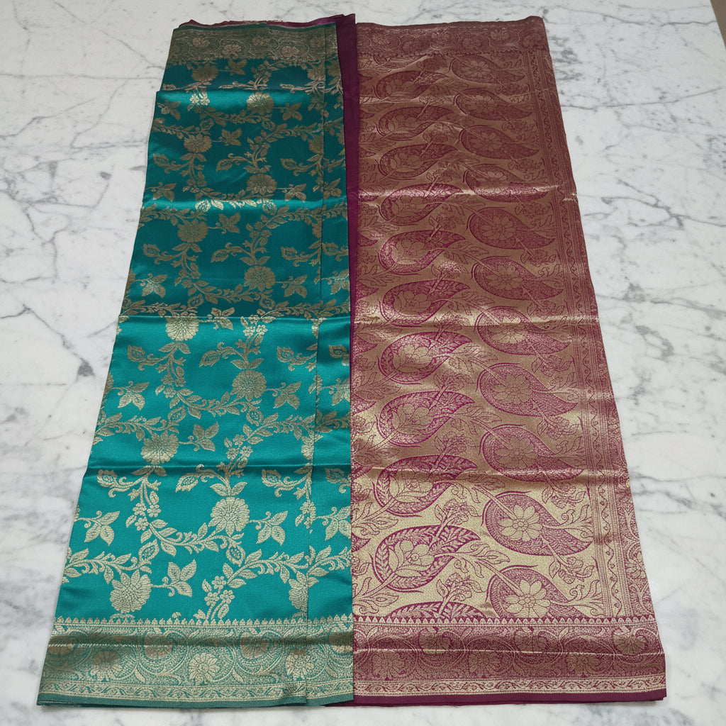Banarasi Pure Silk Saree with luxurious Gold Zari Floral Buttas all over the saree and Pallu with leaf pattern in Turquoise Green Reddish Maroon Color
