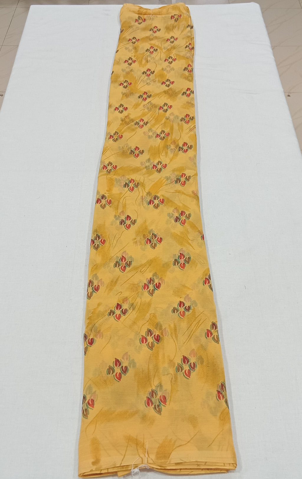 Chiffon Saree with printed Petals in Dark Yellow color