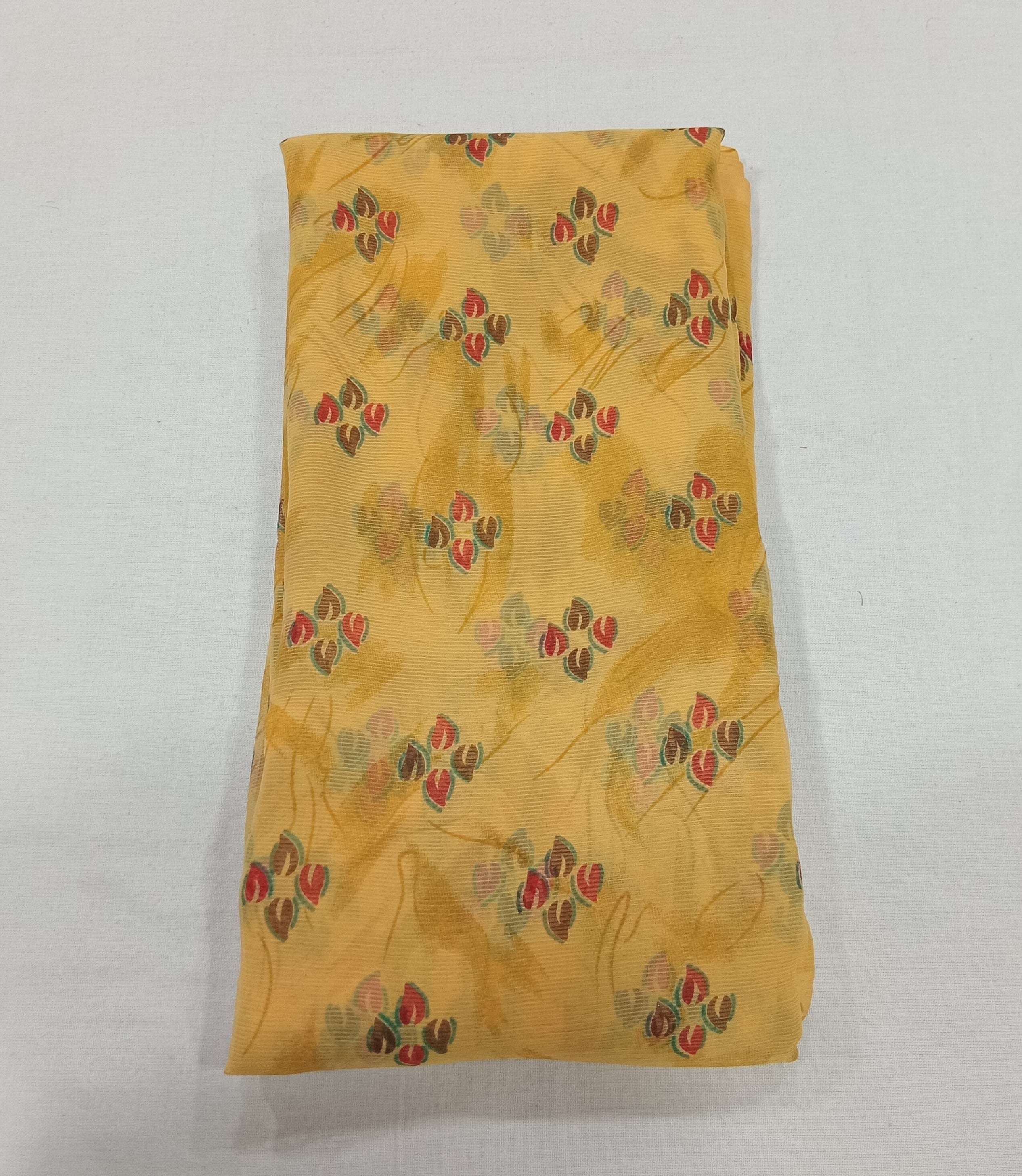 Chiffon Saree with printed Petals in Dark Yellow color