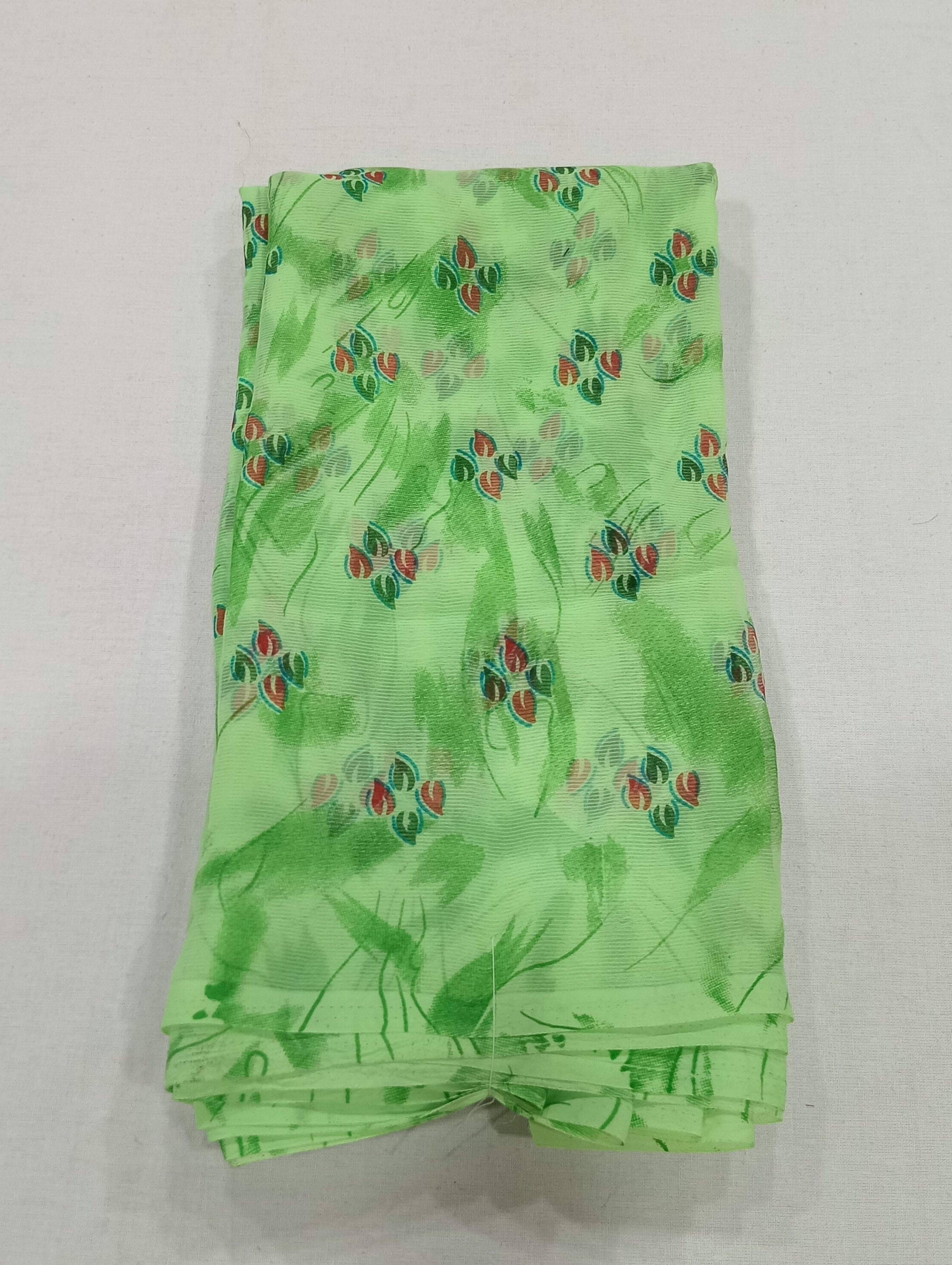 Chiffon Saree with printed Petals in Green color