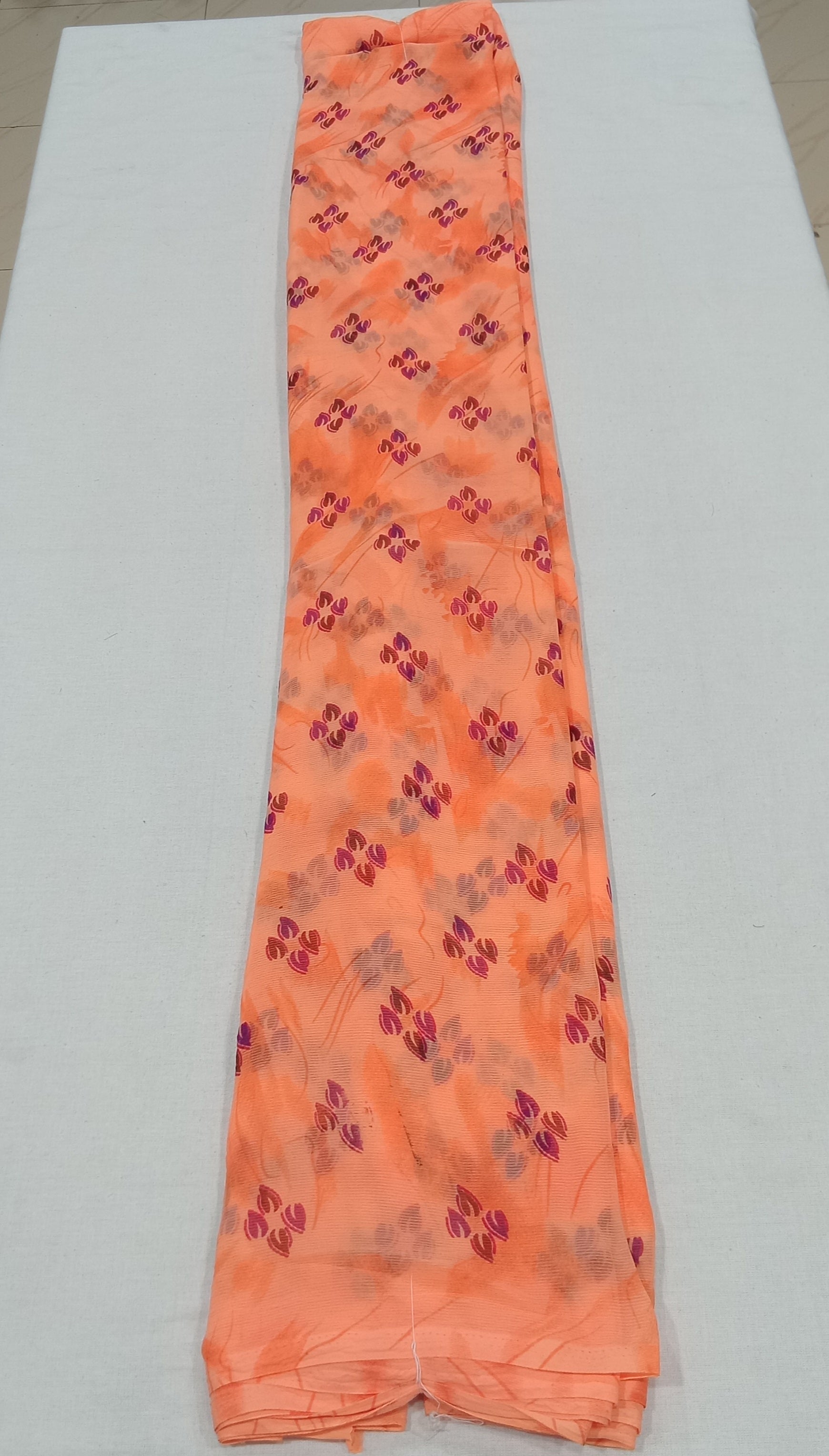 Chiffon Saree with printed Petals in Light Orange color