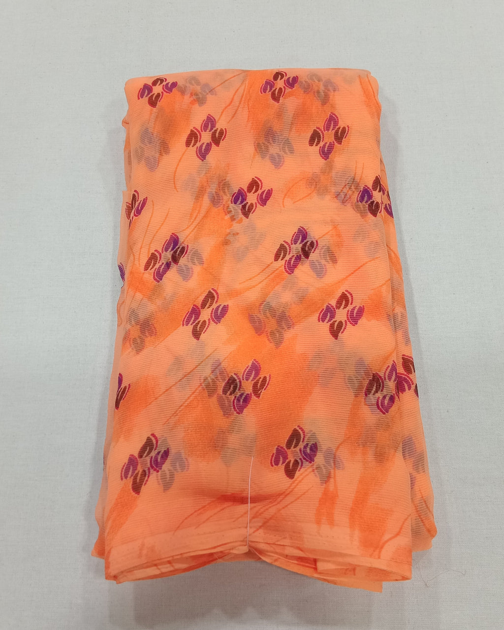 Chiffon Saree with printed Petals in Light Orange color