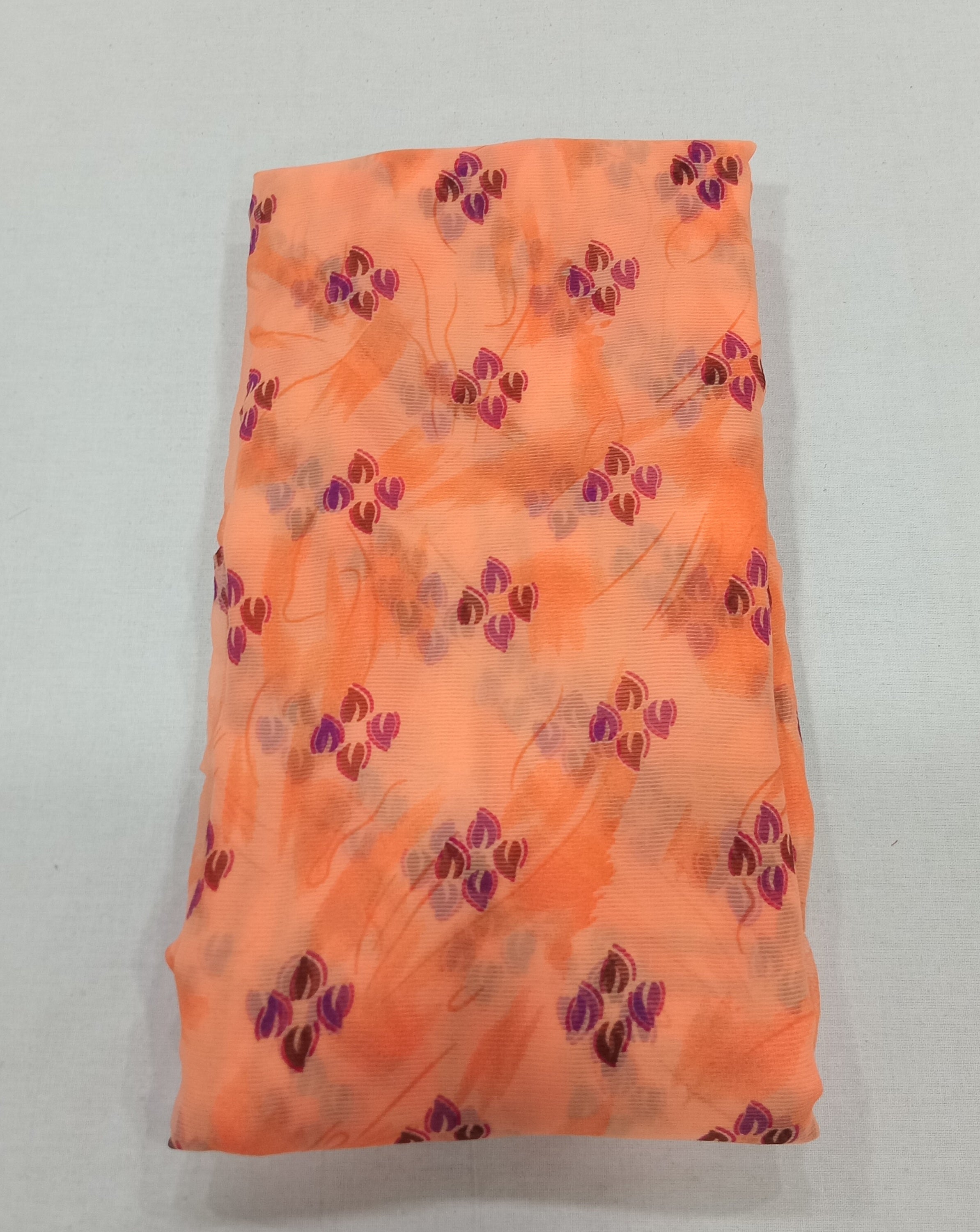 Chiffon Saree with printed Petals in Light Orange color