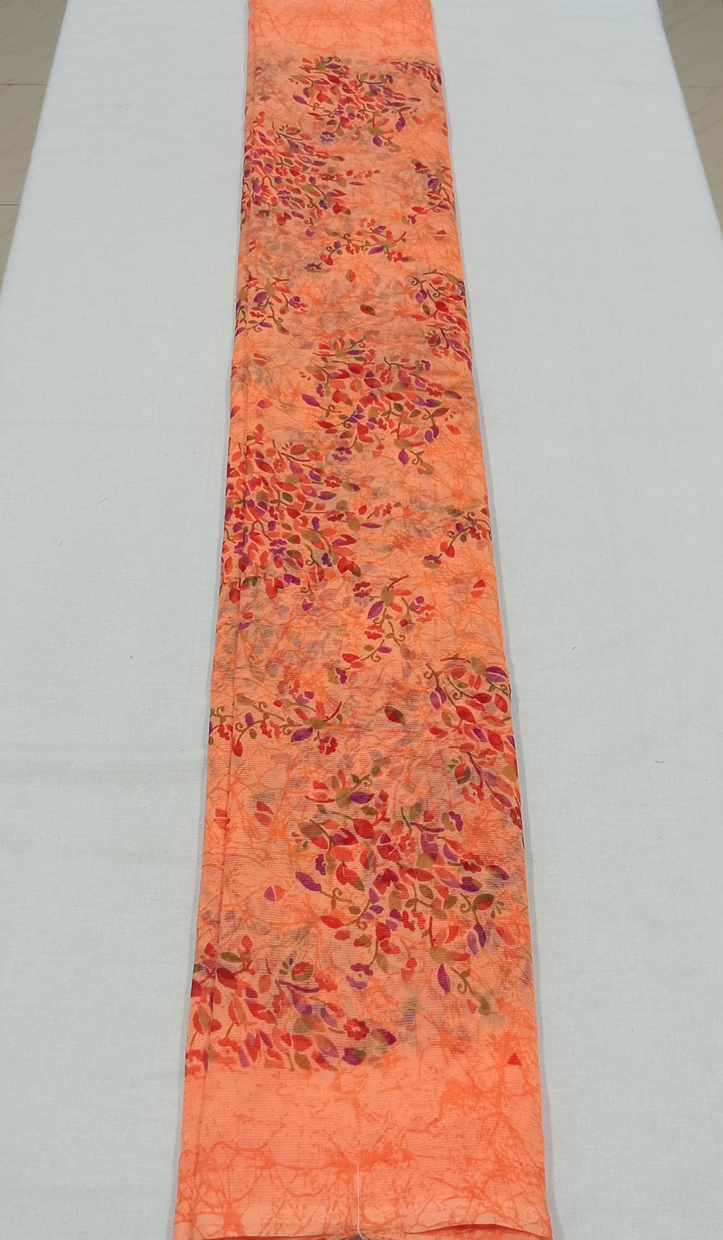 Chiffon Saree with printed Mini Flowers in Orange color