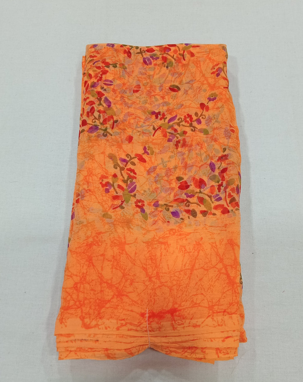 Chiffon Saree with printed Mini Flowers in Orange color