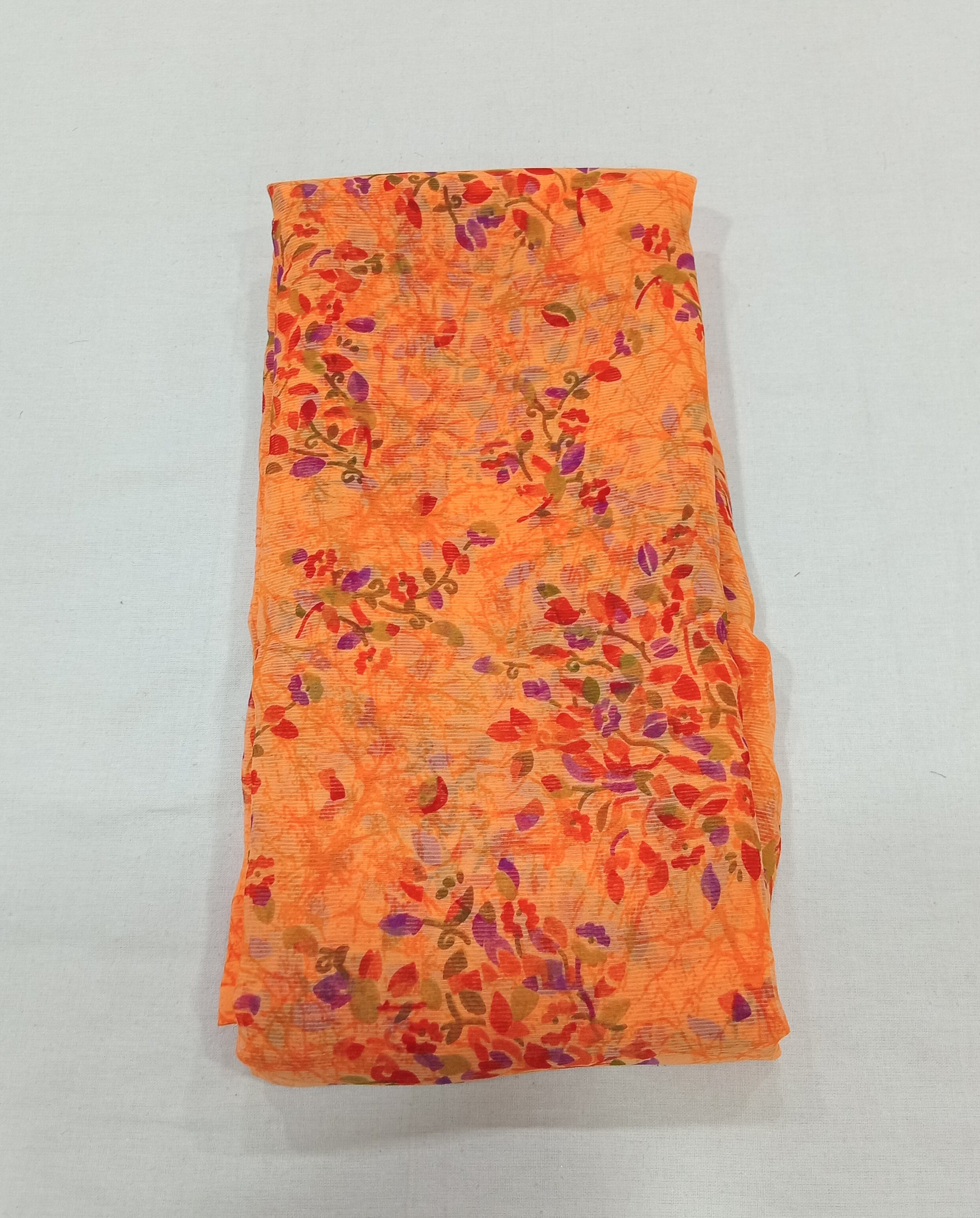 Chiffon Saree with printed Mini Flowers in Orange color