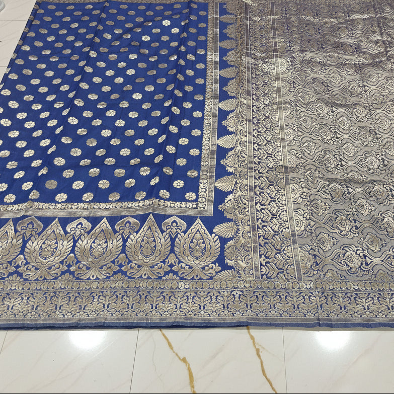 Gold zari buttas detail on navy blue Banarasi silk saree