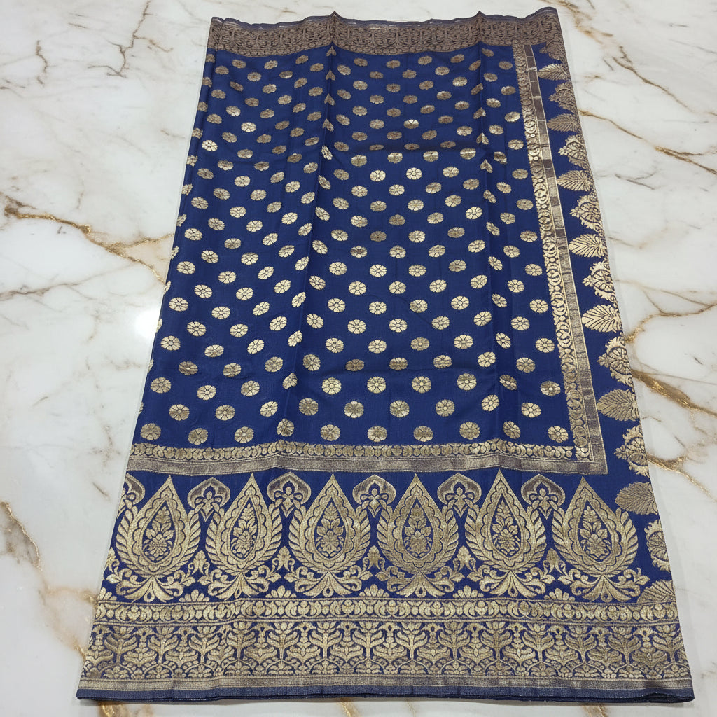 Close-up of zari weave texture on navy blue Banarasi silk saree