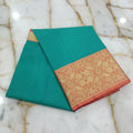 Silk Cotton Saree with intricate weaving border and pallu in Green Color with contrast borders