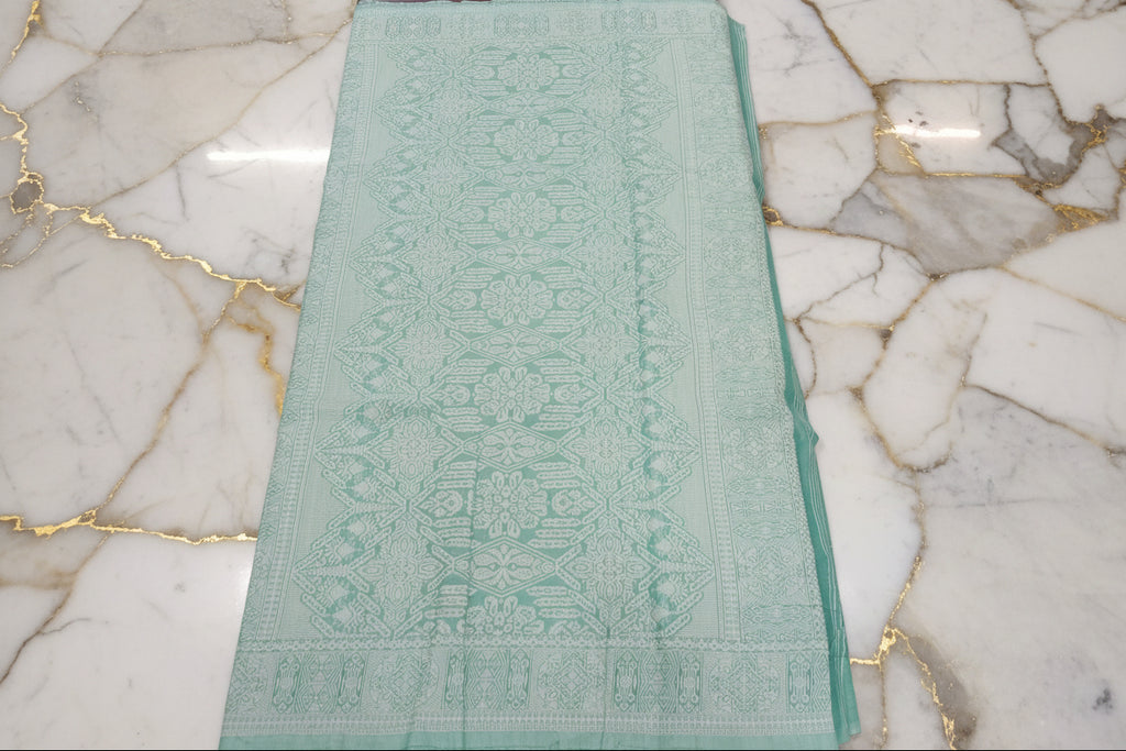 Silk Cotton Saree with floral pattern all over saree and Border in Light Green color