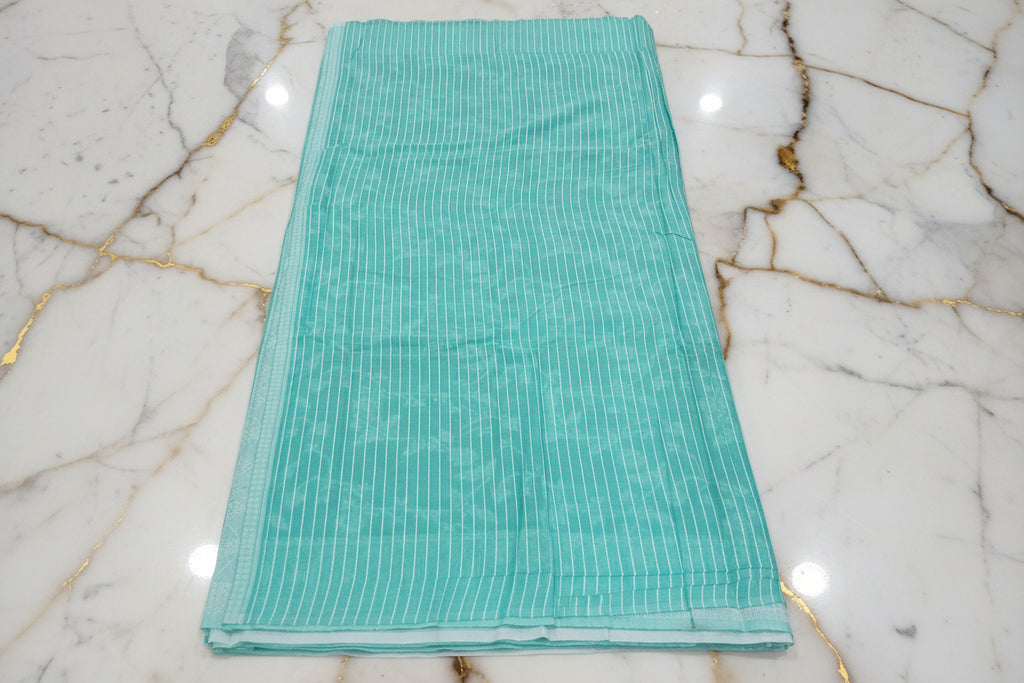 Silk Cotton Saree with floral pattern all over saree and Border in Light Green color