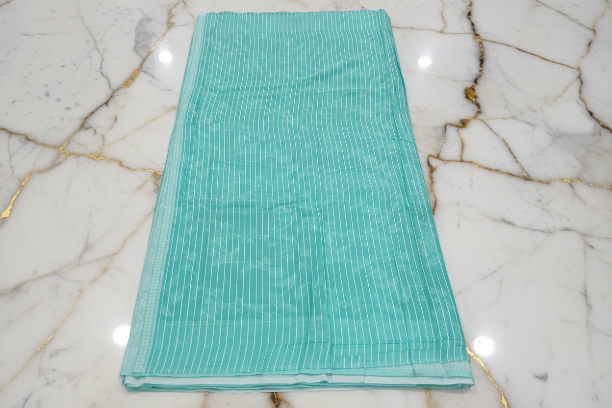 Silk Cotton Saree with floral pattern all over saree and Border in Light Green color