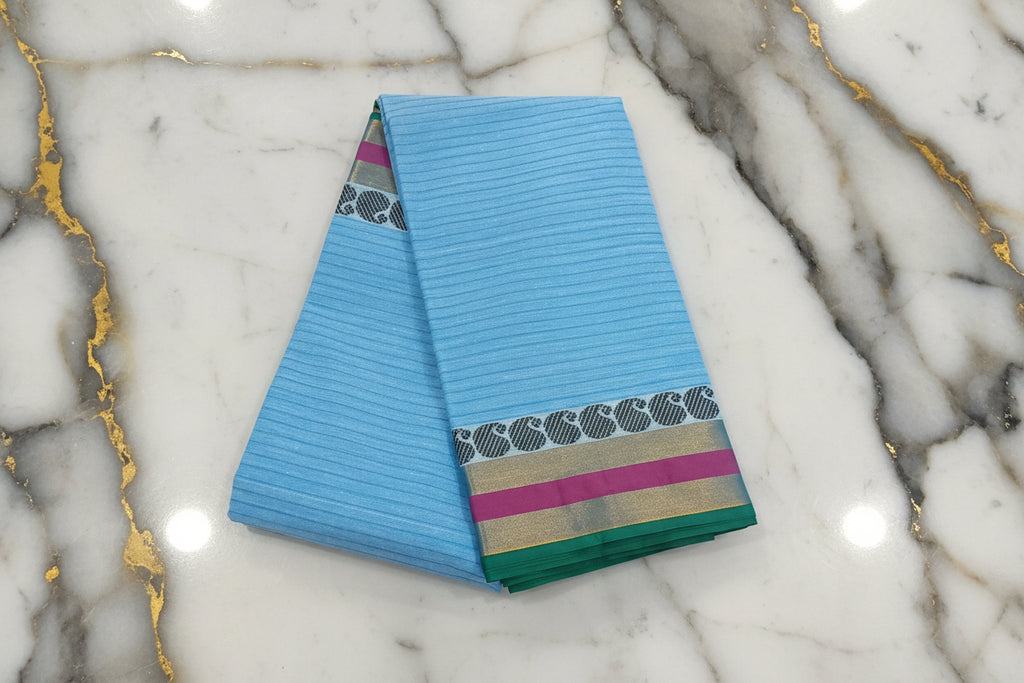 Silk Cotton Saree with floral pattern Border Gold Zari in Light Blue Color