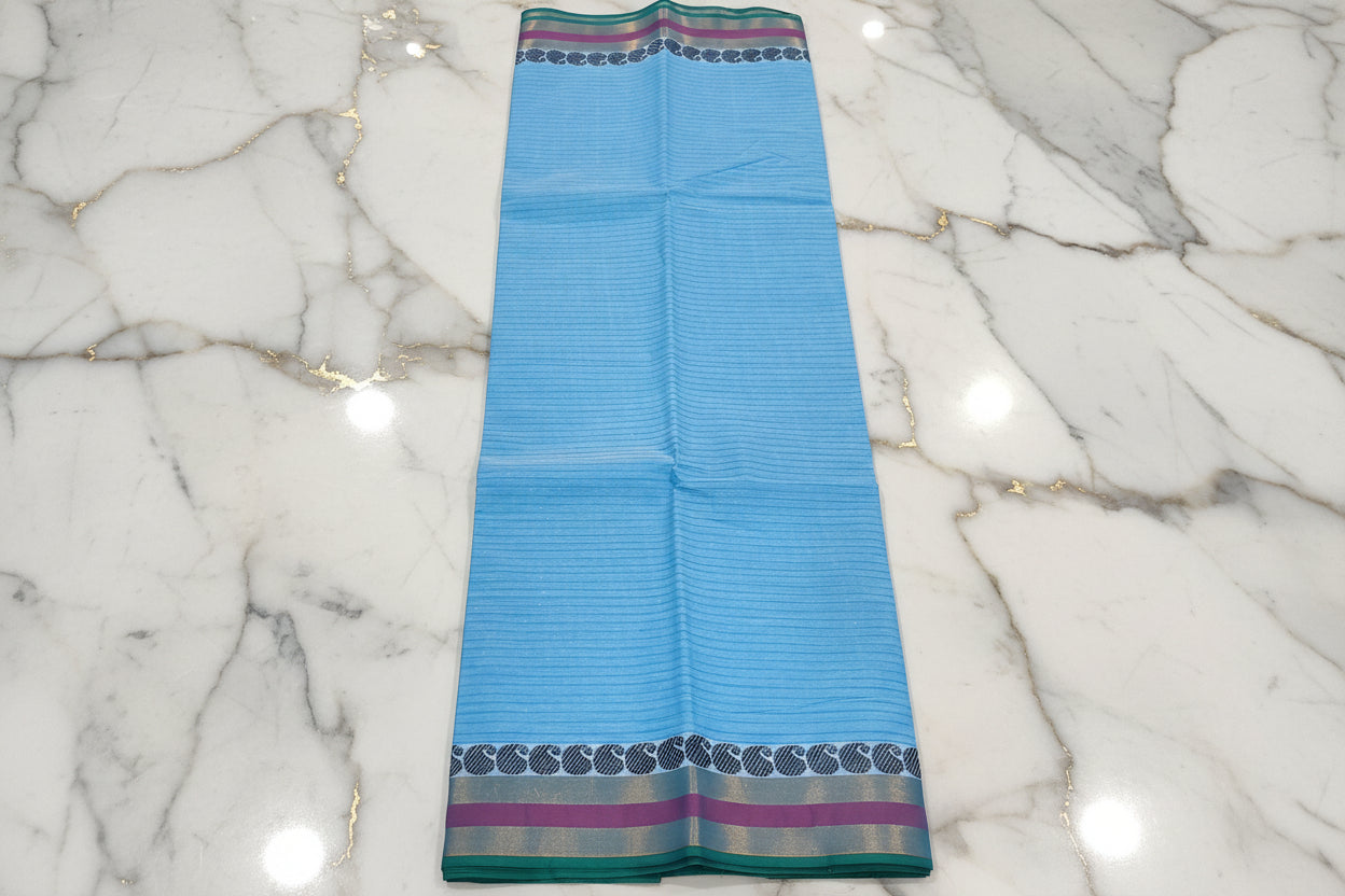 Silk Cotton Saree with floral pattern Border Gold Zari in Light Blue Color