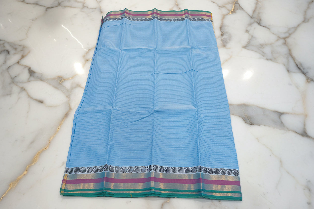 Silk Cotton Saree with floral pattern Border Gold Zari in Light Blue Color