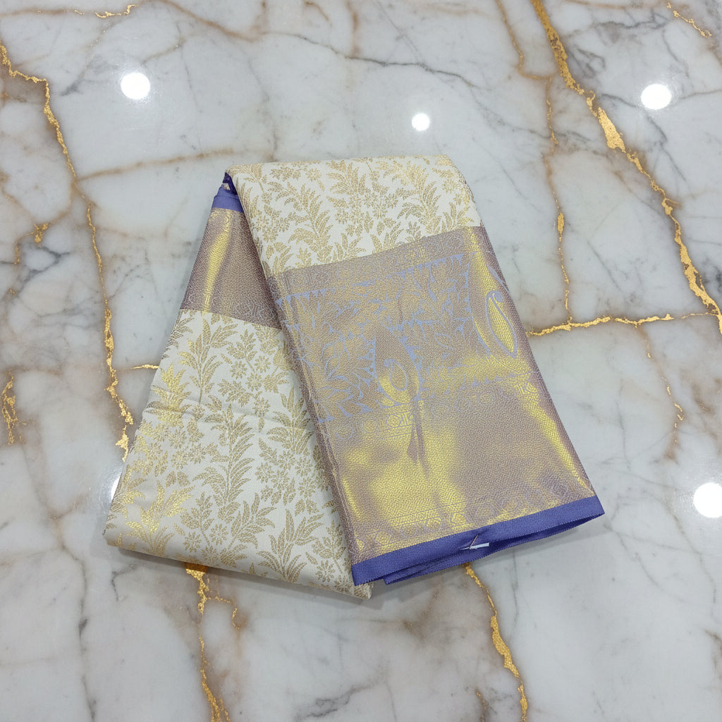 Kanchipuram Silk Saree with full gold zari weaving in Light Cream color in contrast Bluish Purple color border