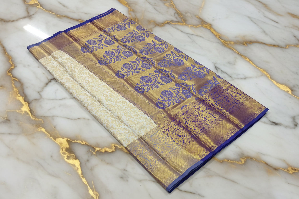 Kanchipuram Silk Saree with full gold zari weaving in Light Cream color in contrast Bluish Purple color border