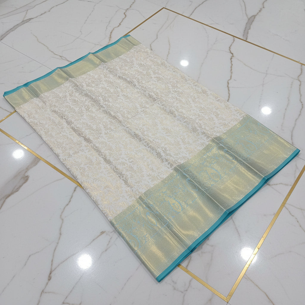 Kanchipuram Silk Saree with full gold zari weaving in Light Cream color in contrast Green color border