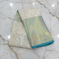 Kanchipuram Silk Saree with full gold zari weaving in Light Cream color in contrast Green color border