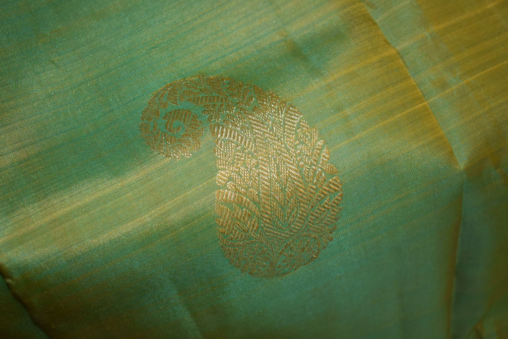 Kanchipuram Pure Silk Saree with bright gold Zari Motifs in Fresh Green leaf Color