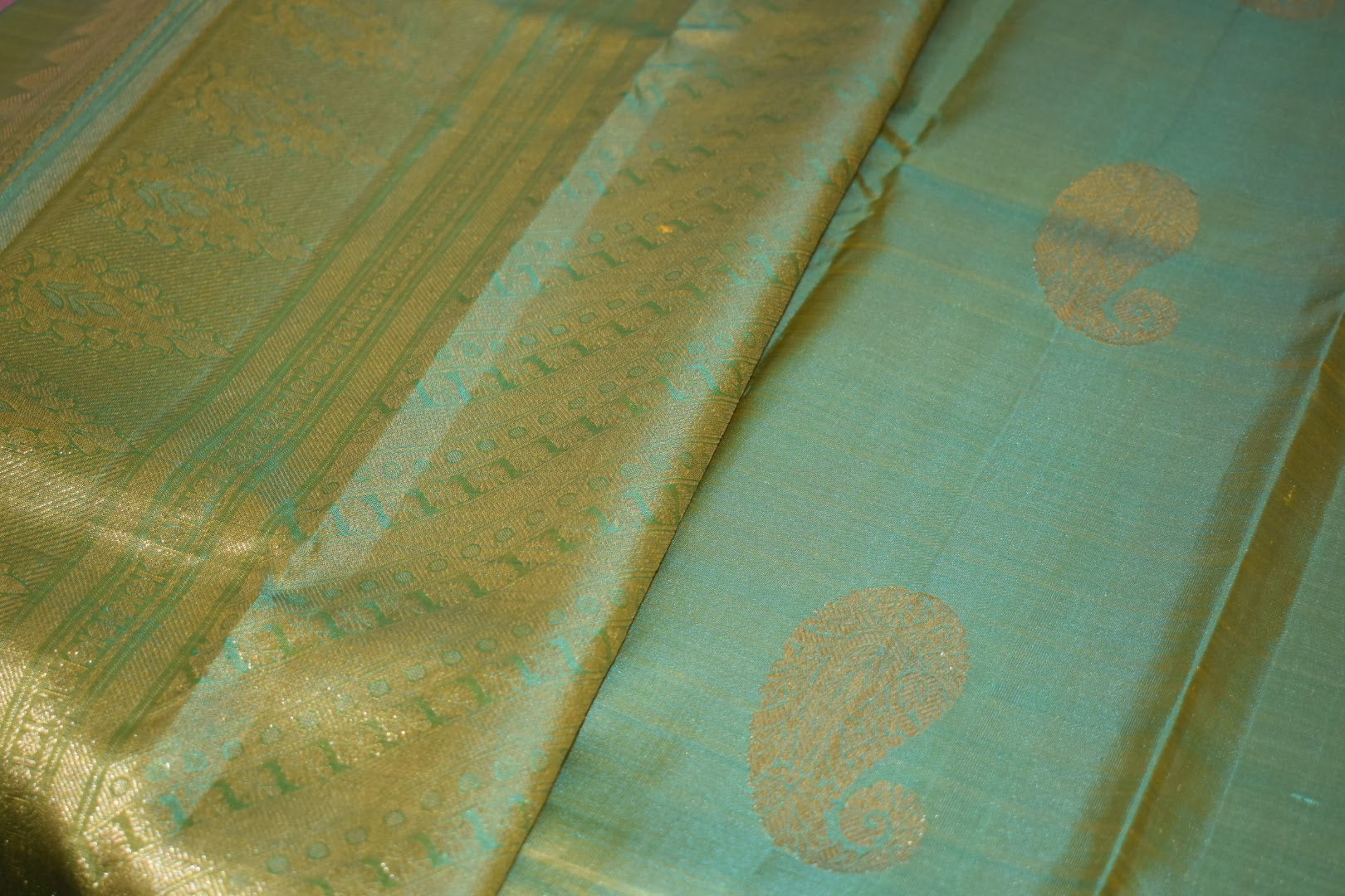 Kanchipuram Pure Silk Saree with bright gold Zari Motifs in Fresh Green leaf Color