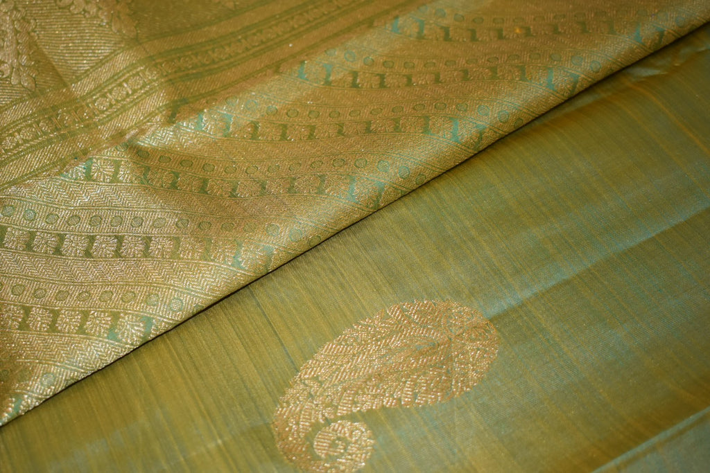 Kanchipuram Pure Silk Saree with bright gold Zari Motifs in Fresh Green leaf Color