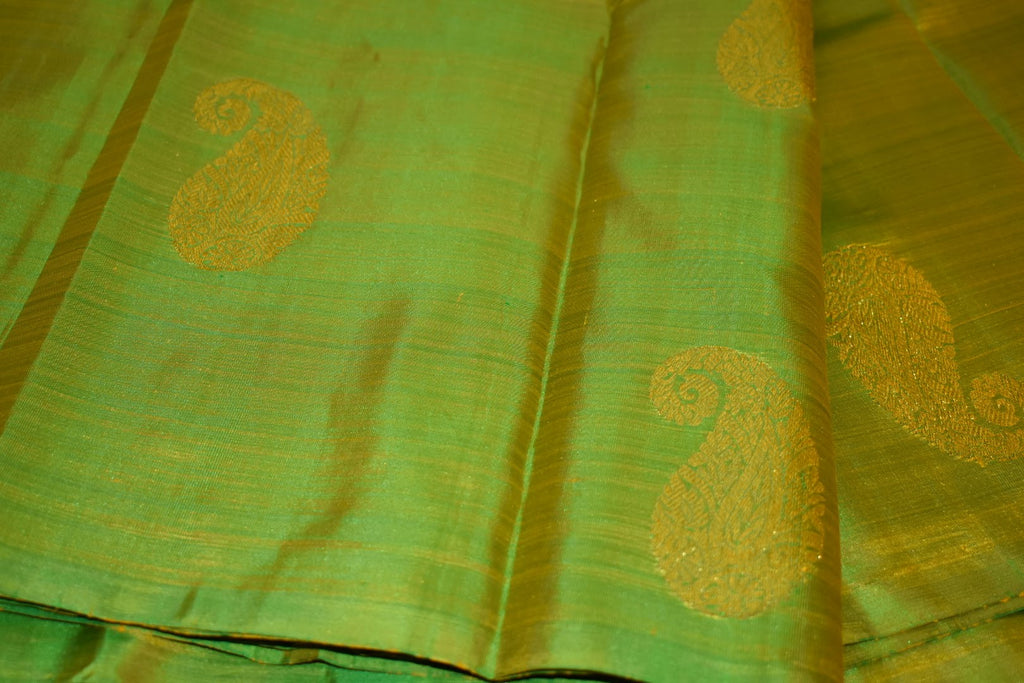 Kanchipuram Pure Silk Saree with bright gold Zari Motifs in Fresh Green leaf Color