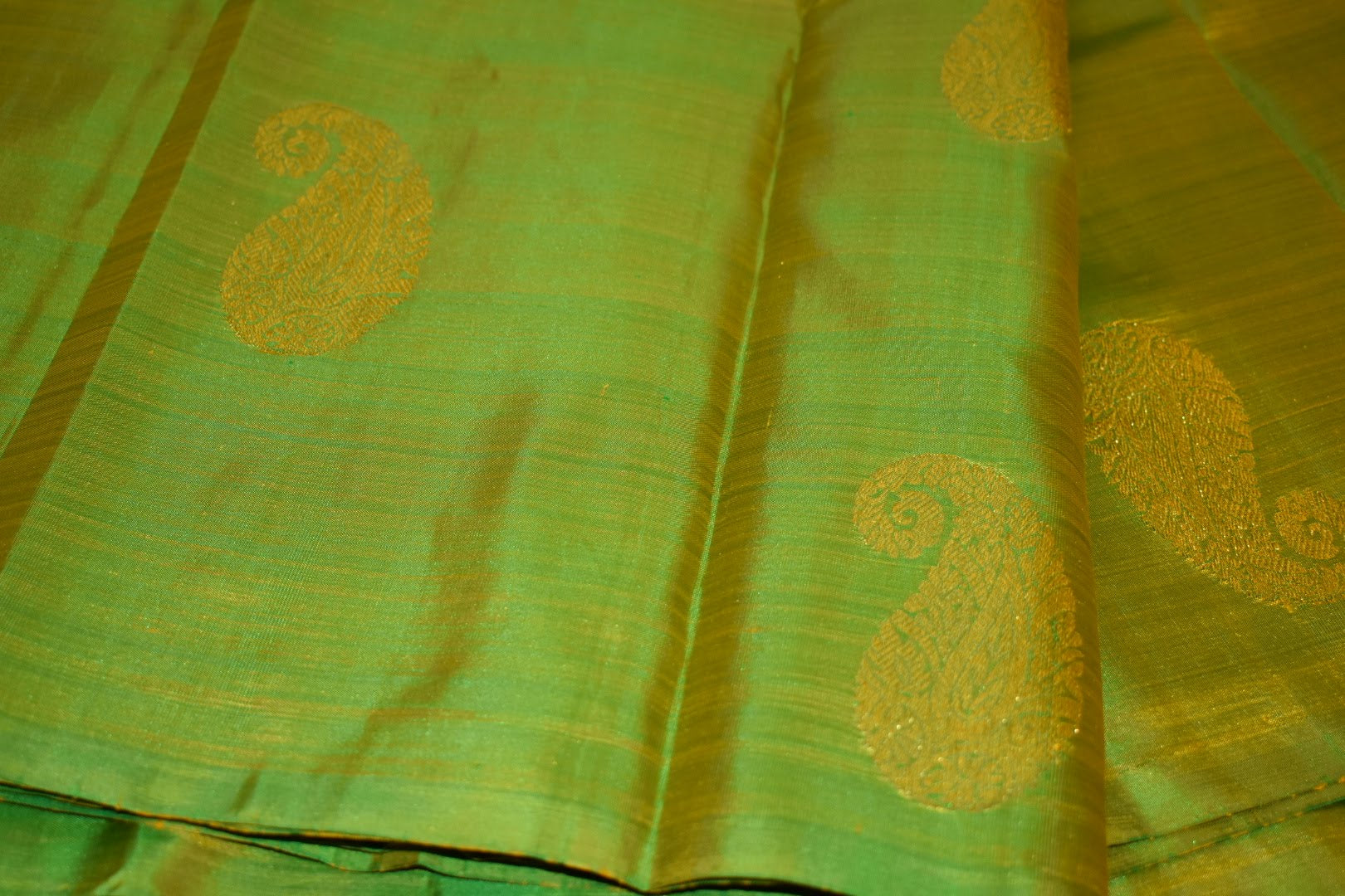 Kanchipuram Pure Silk Saree with bright gold Zari Motifs in Fresh Green leaf Color