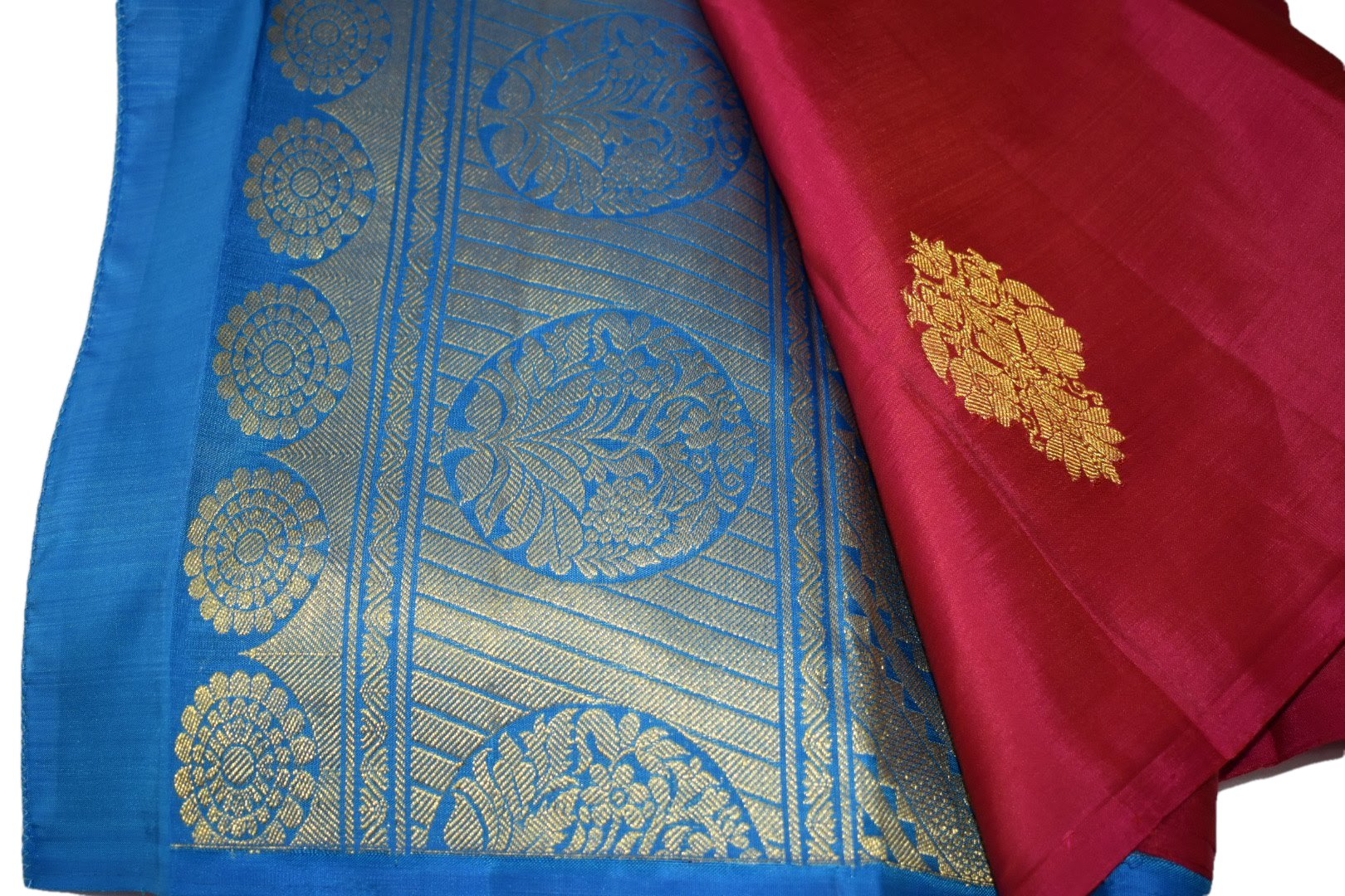 Kanchipuram Pure Silk Saree with bright gold Zari Motifs in Royal Pink color and Contrast Royal Blue Border