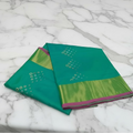 Kanchipuram Pure Silk Saree with mini buttas and two toned Gold border in Aqua Green color