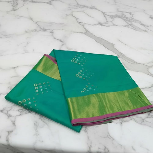 Aqua Green Kanchipuram pure silk saree with two-tone gold border