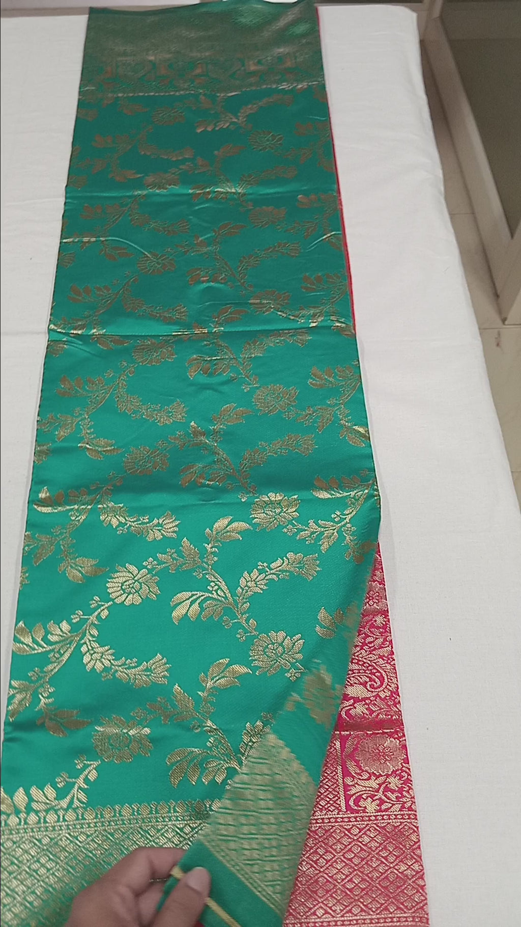Banarasi Pure Silk Saree with luxurious Gold Zari Floral Buttas all over the saree and Pallu in Aqua Green and Reddish Pink Color