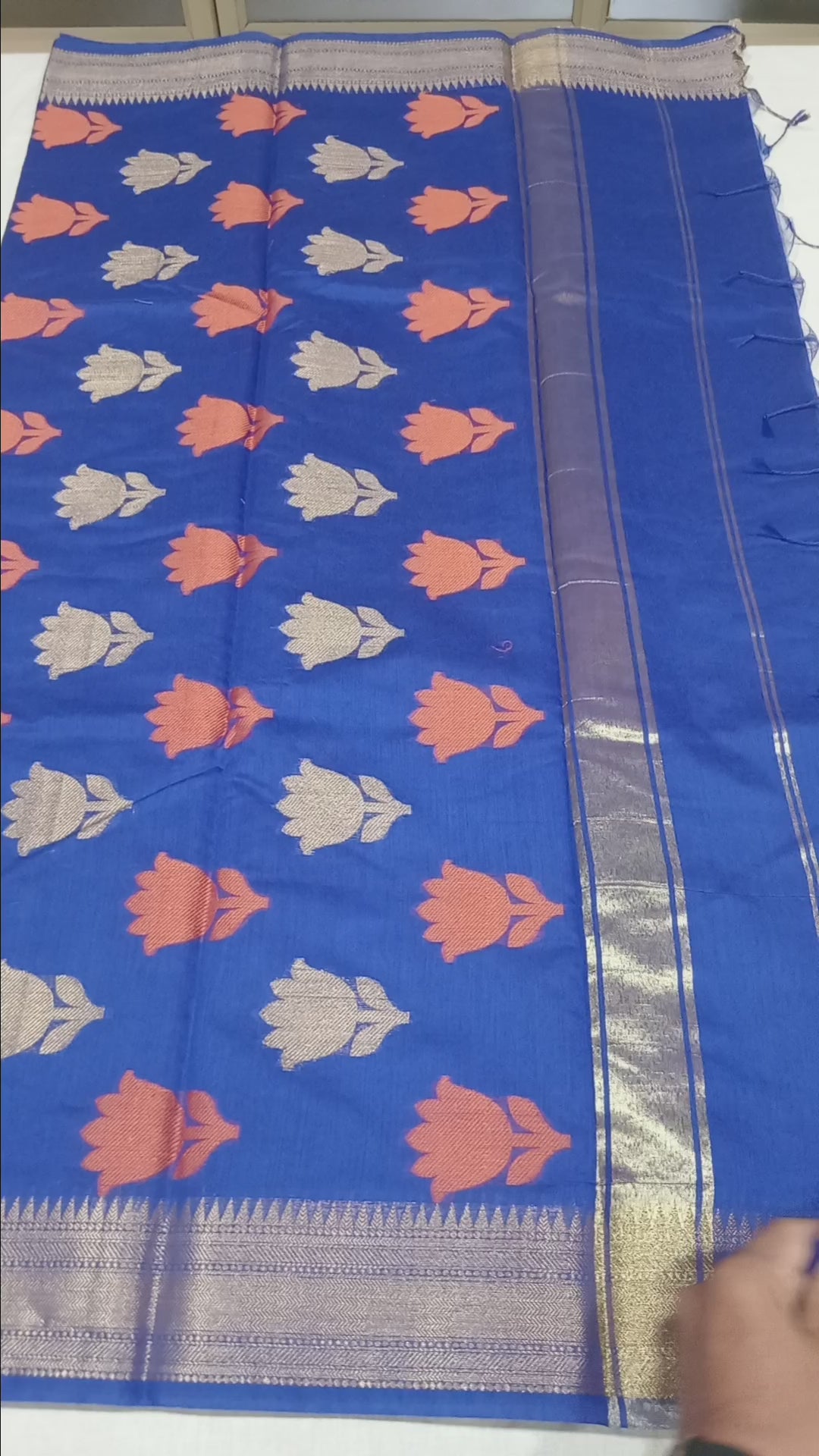 Chandheri Silk Saree with Flower Polka Dots Buttas with Gold Zari Border and Tassels in Royal Blue color