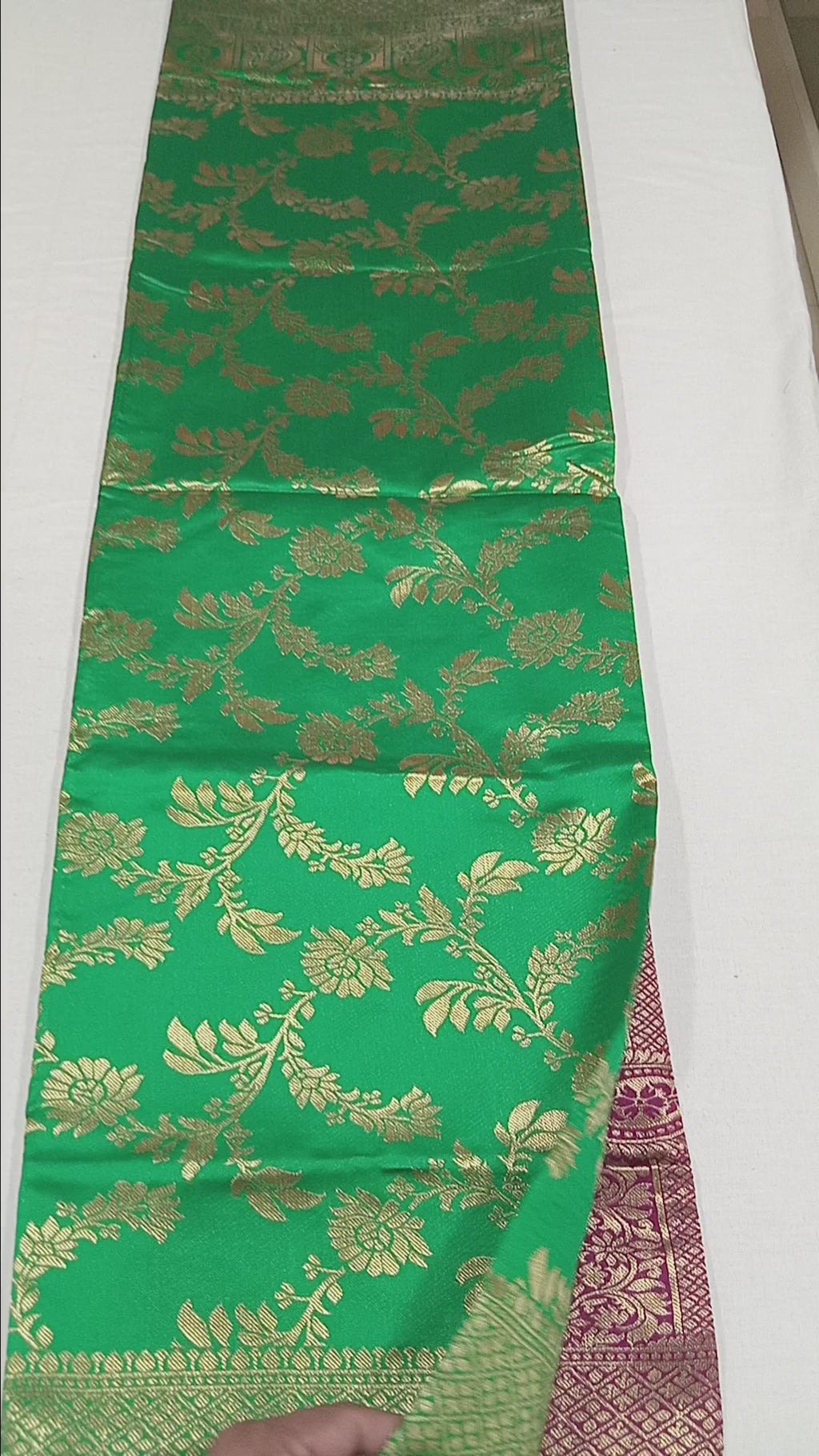 Banarasi Pure Silk Saree with luxurious Gold Zari Floral Buttas all over the saree and Pallu in Leaf Green and Maroon  Color