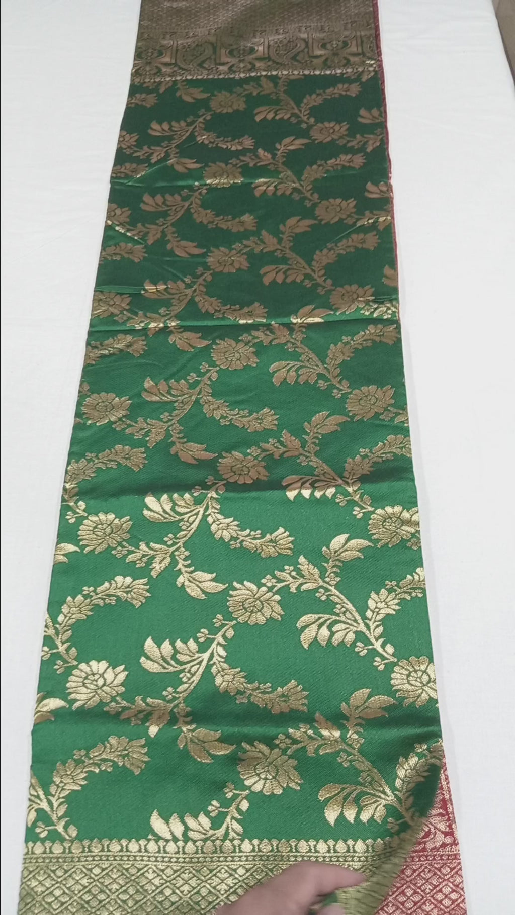 Banarasi Pure Silk Saree with luxurious Gold Zari Floral Buttas all over the saree and Pallu in Green and Red Color