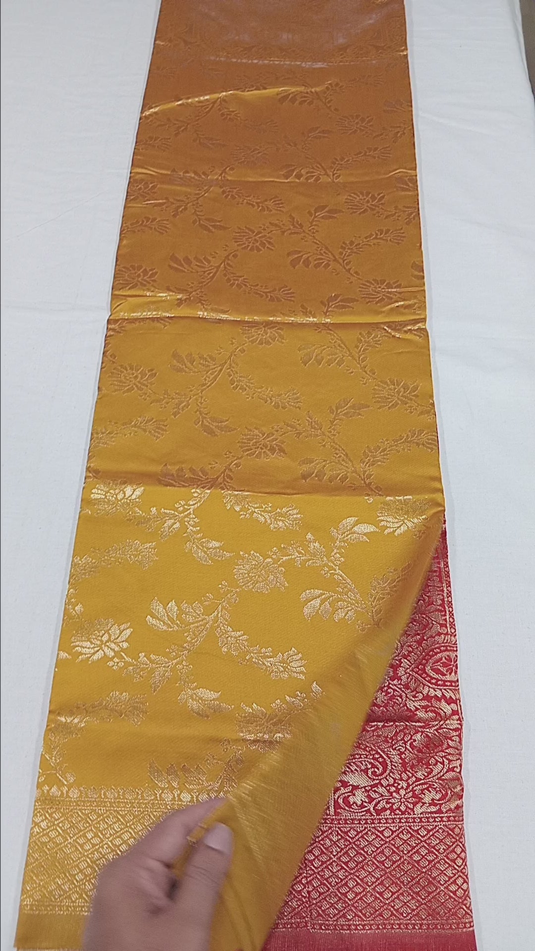 Banarasi Pure Silk Saree with luxurious Gold Zari Floral Buttas all over the saree and Pallu in Yellow and Dark Red Color