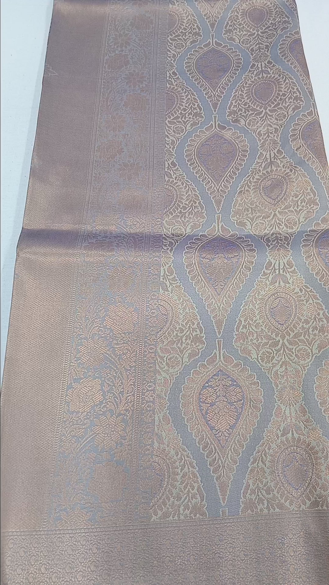 Kanchipuram Pure Silk Saree with detailed Butta motifs and luxurious Pallu in Grey color