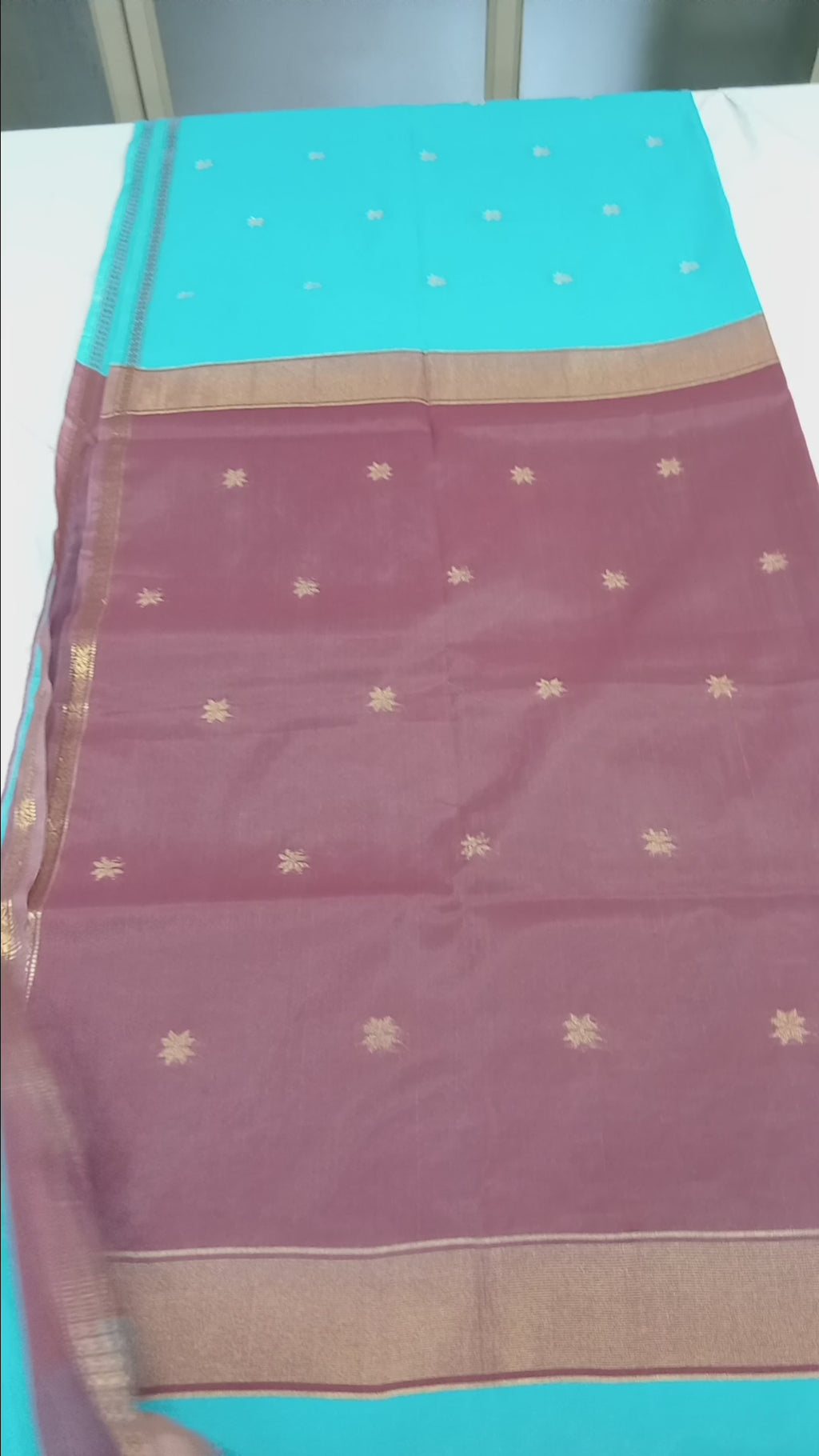 Chandheri Silk Saree with beautiful Butta Motifs in Turquoise Blue and Coffee Brown Contrast with Tassels