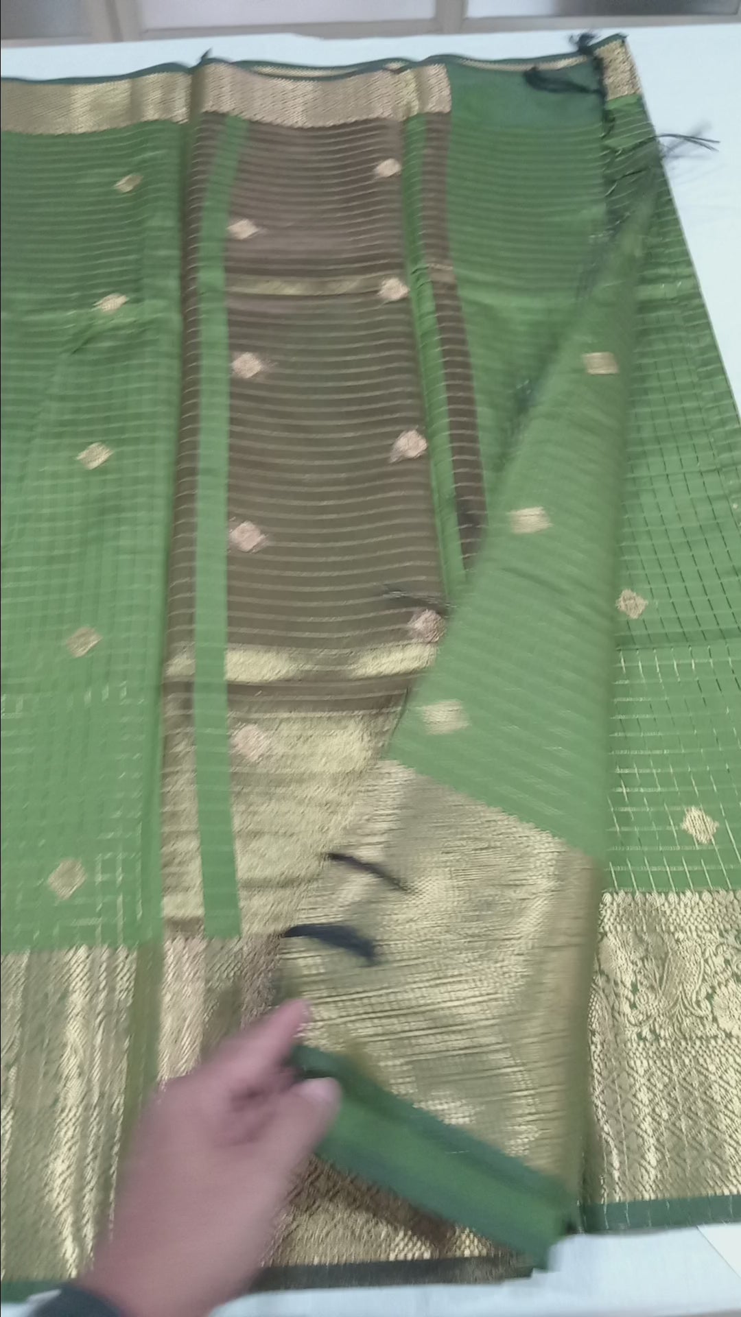 Kanchipuram Silk saree with Gold Zari checkered pattern with Gold Butta all over saree and pallu in Green color