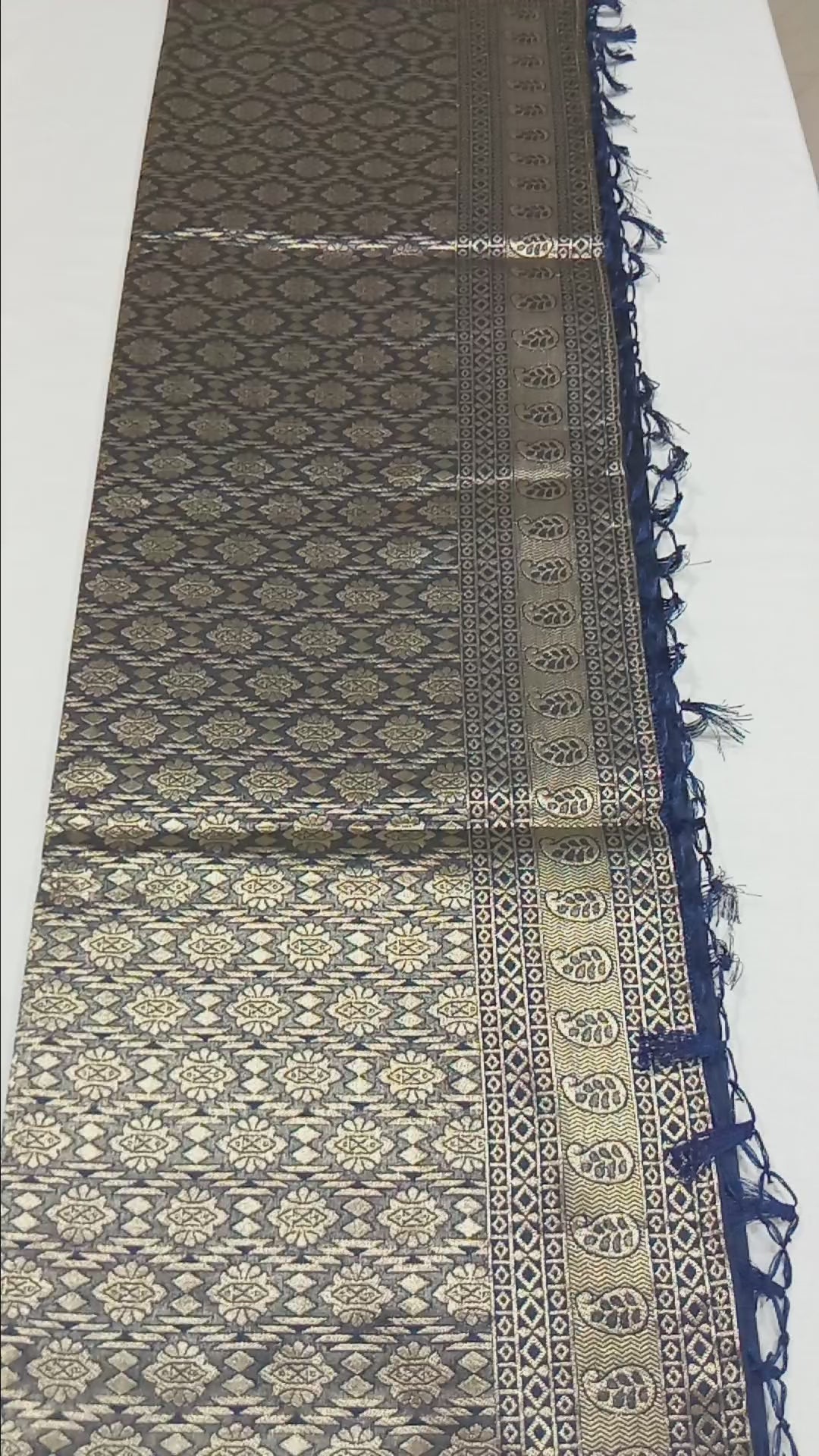 Banarasi Pure Silk Saree with mini gold zari butta motif all over saree with elaborate gold zari border and pallu in Navy Blue color