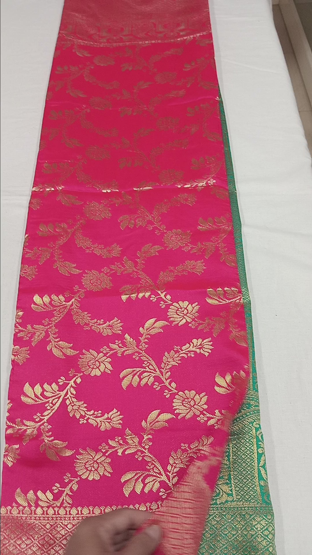 Banarasi Pure Silk Saree with luxurious Gold Zari Floral Buttas all over the saree and Pallu in Royal Pink and Green Color
