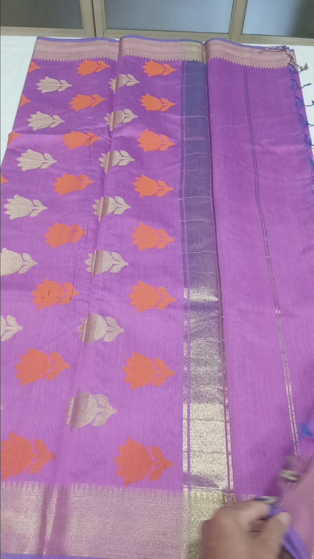 Chandheri Silk Saree with Flower Polka Dots Buttas with Gold Zari Border and Tassels in Lotus Pink color