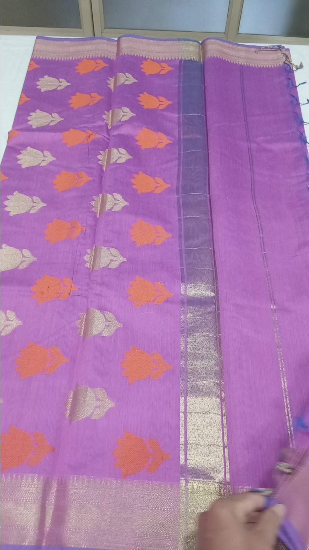 Chandheri Silk Saree with Flower Polka Dots Buttas with Gold Zari Border and Tassels in Lotus Pink color