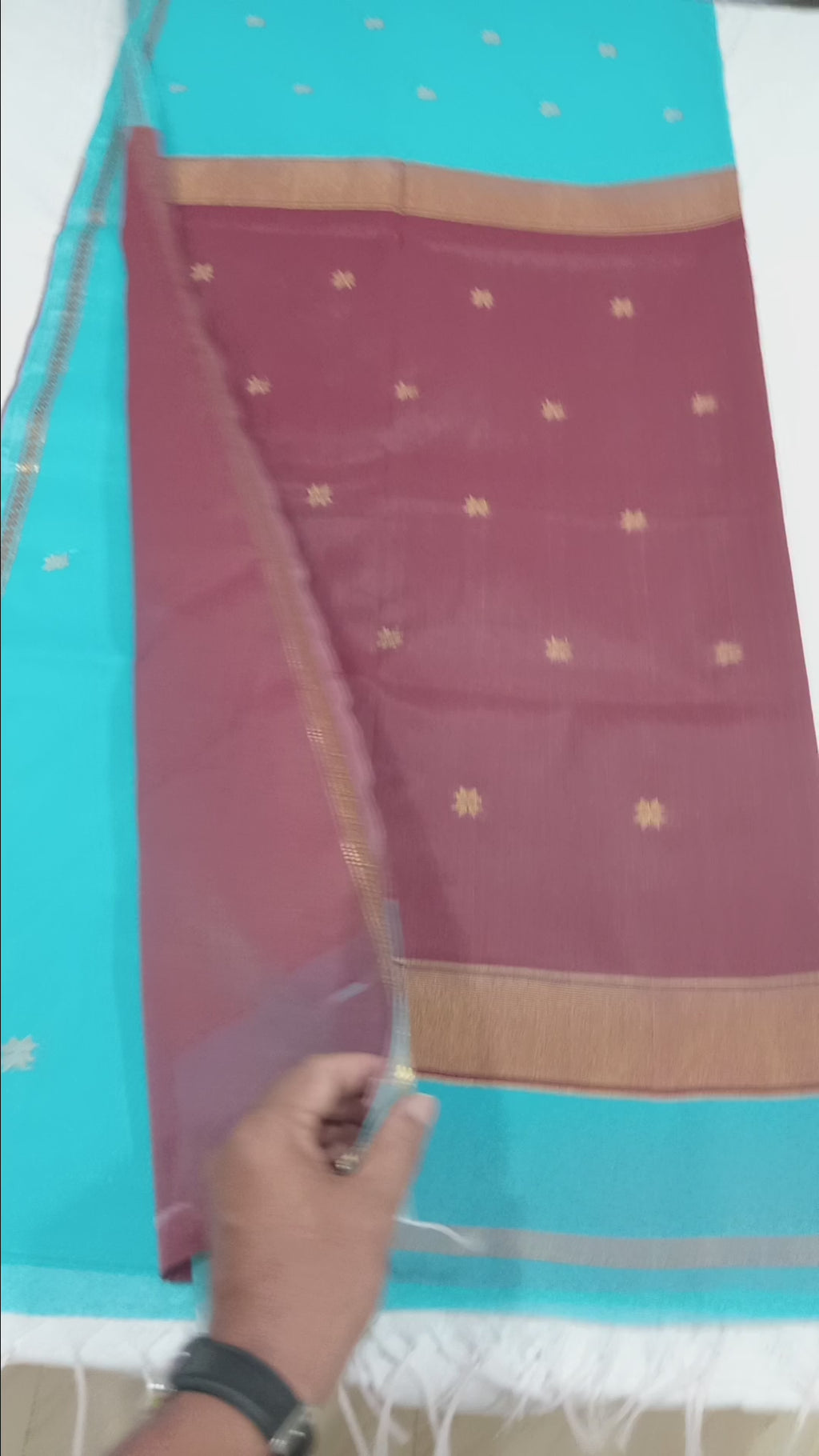Chandheri Silk Saree with beautiful Butta Motifs in Turquoise Blue and Coffee Brown Contrast with Tassels