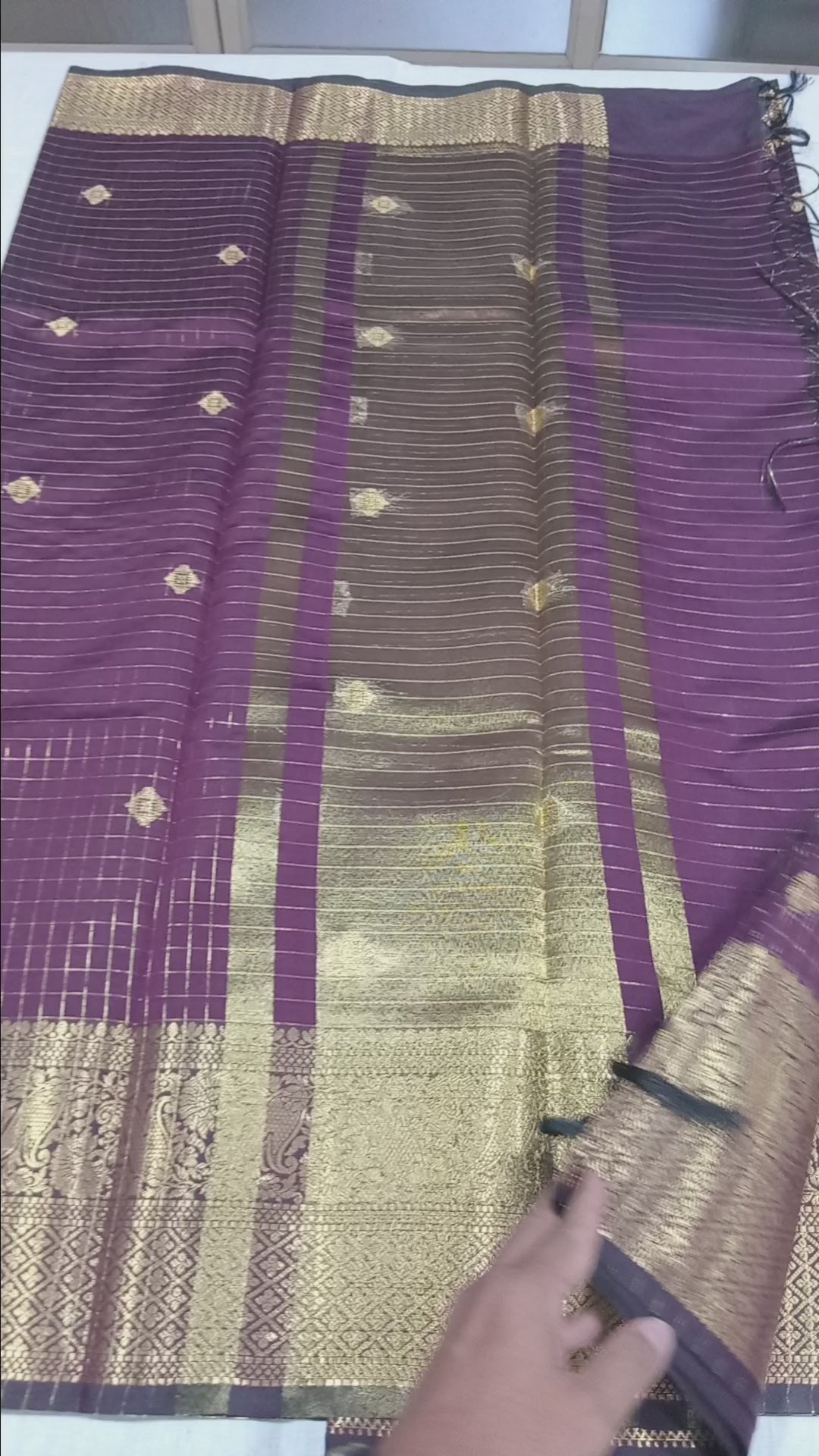 Kanchipuram Silk saree with Gold Zari checkered pattern with Gold Butta all over saree and pallu in Maroon color
