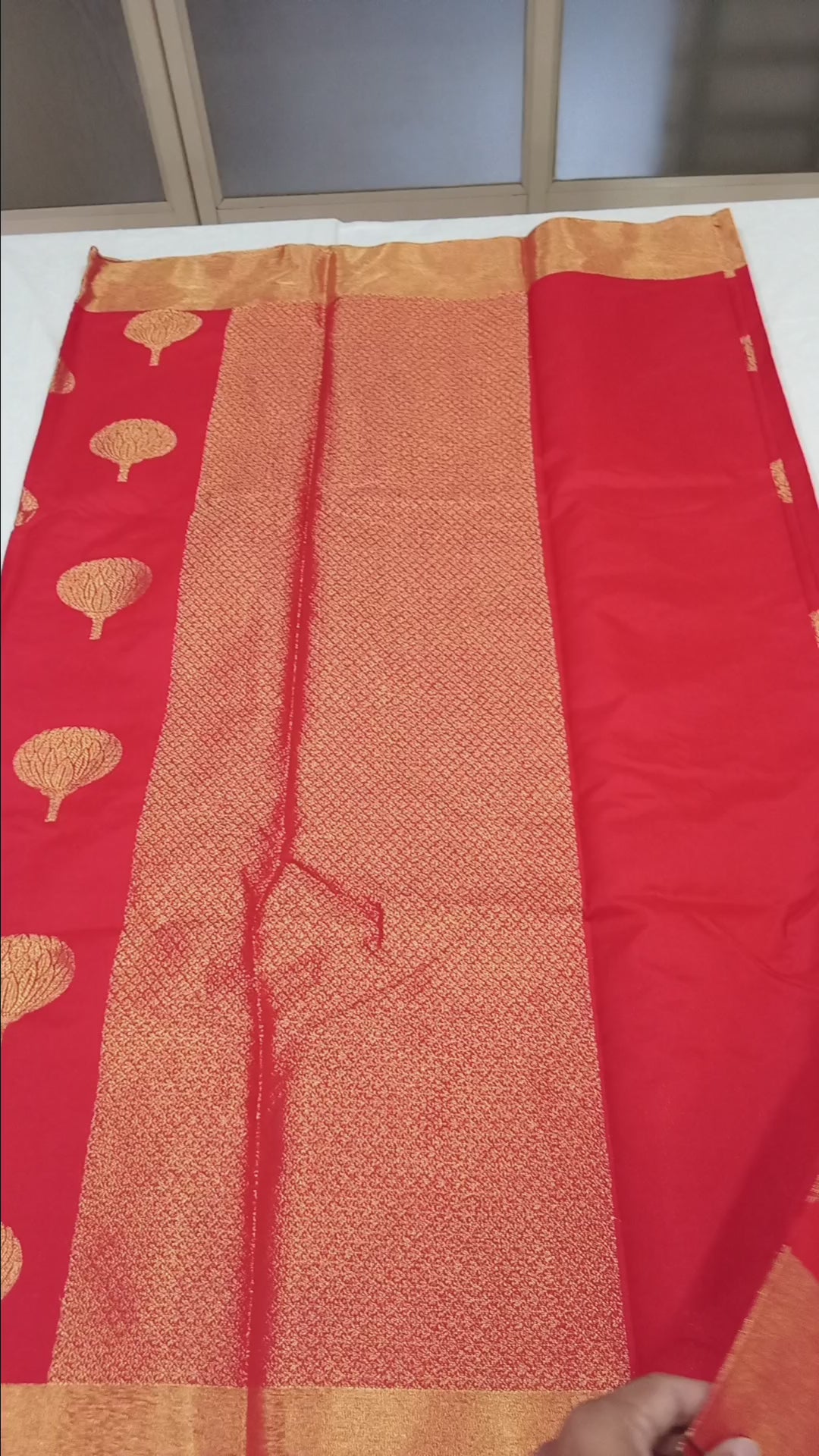 Kanchipuram Silk saree with Gold Zari pattern with Gold Butta all over saree and pallu in Red Color